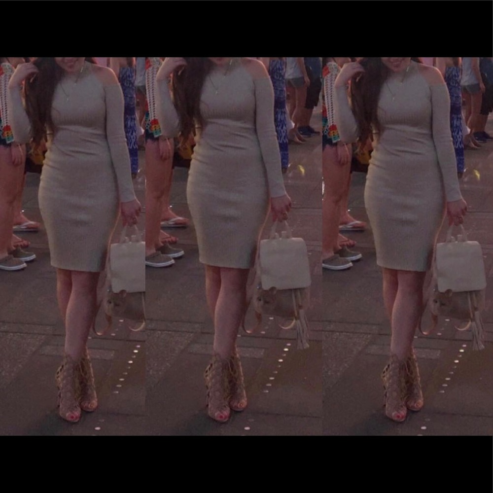 A open shoulder body con dress.